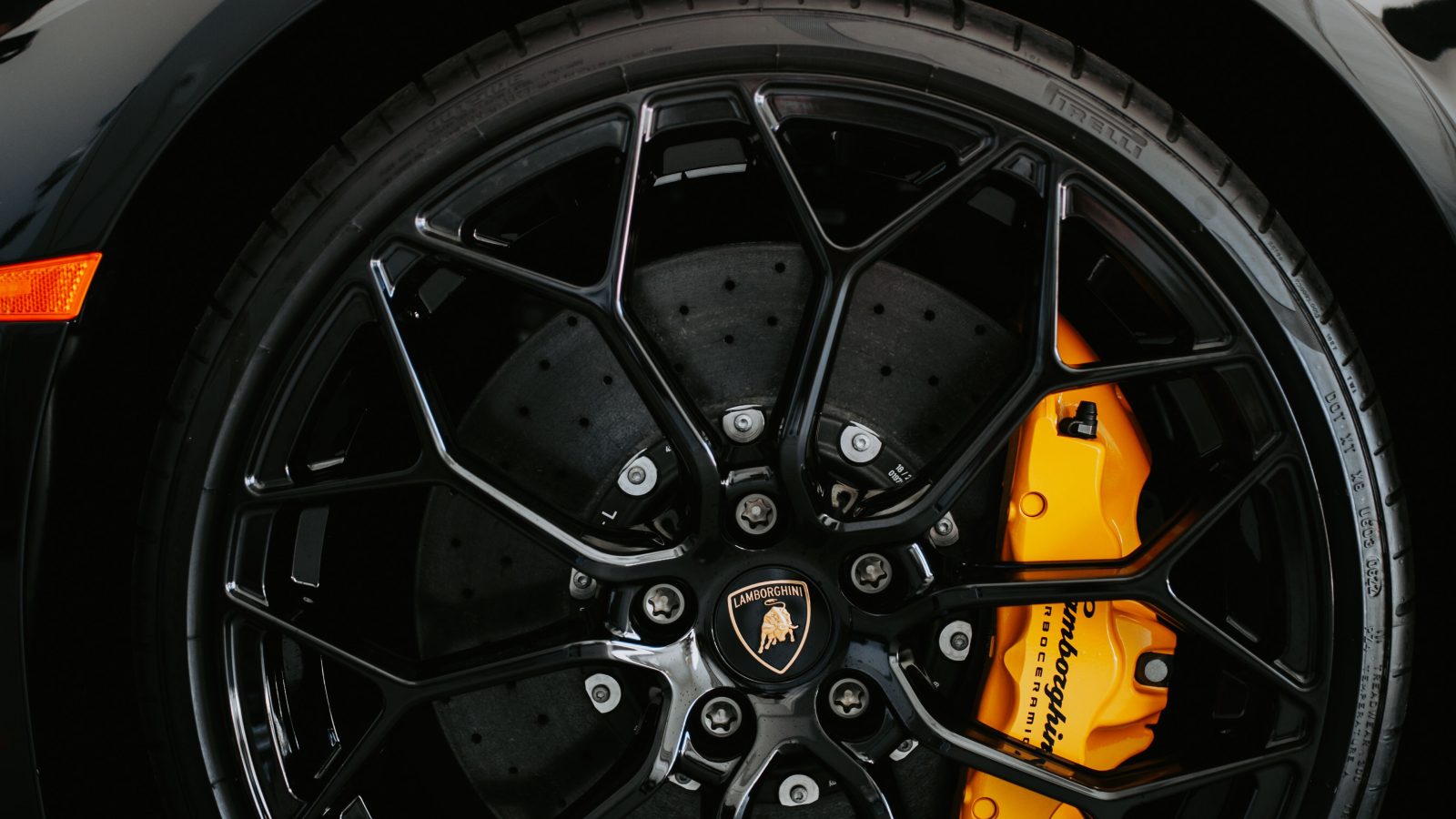 Close-up of a car wheel and brake caliper