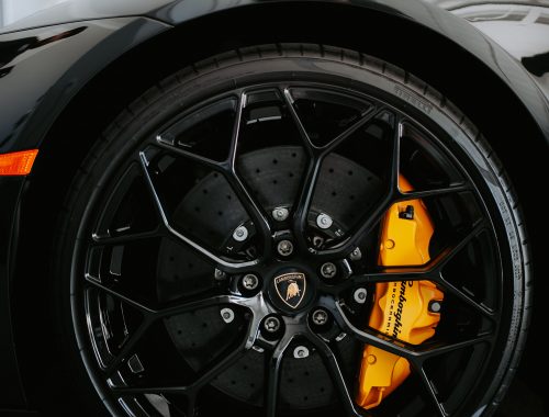 Close-up of a car wheel and brake caliper