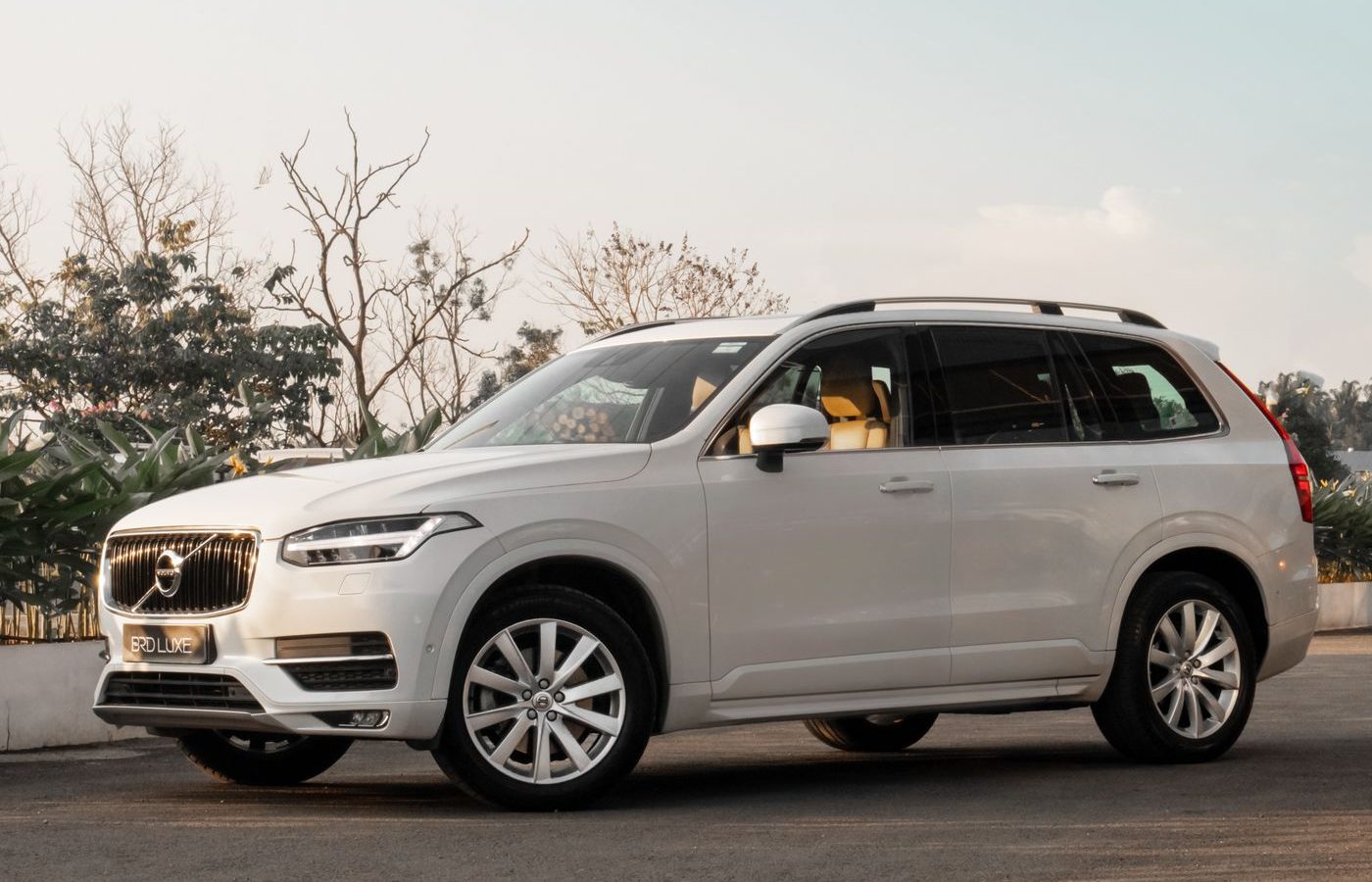 White compact crossover SUV on a road, representing the small-SUV segment