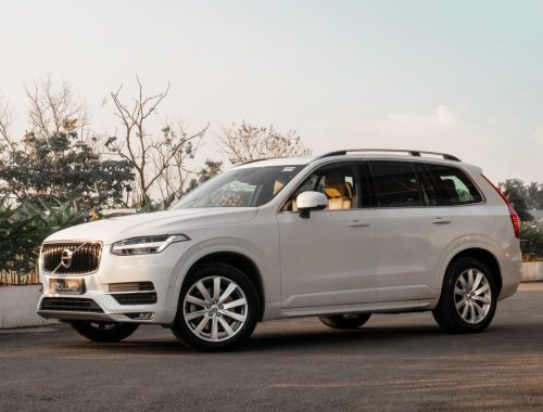 White compact crossover SUV on a road, representing the small-SUV segment