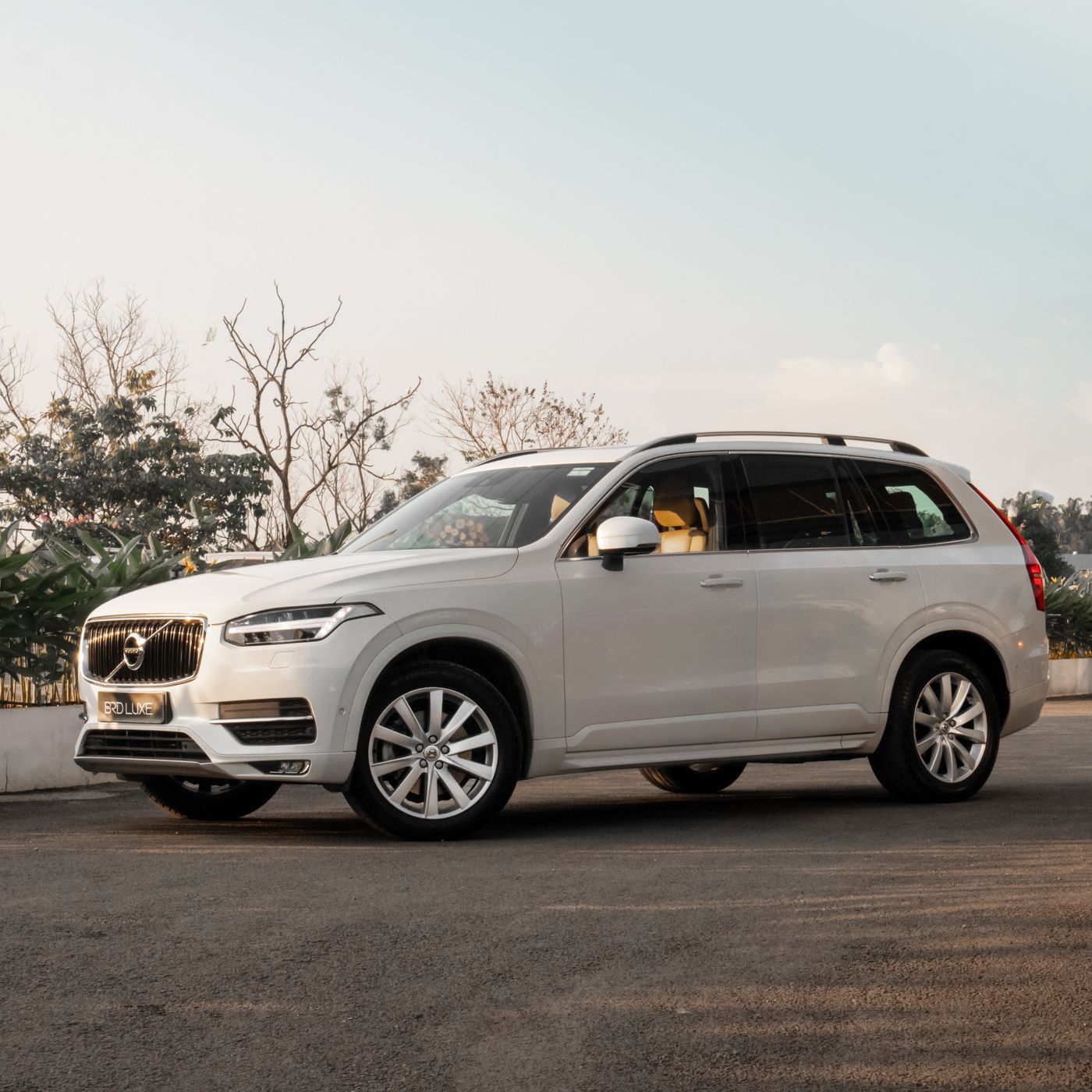 White compact crossover SUV on a road, representing the small-SUV segment