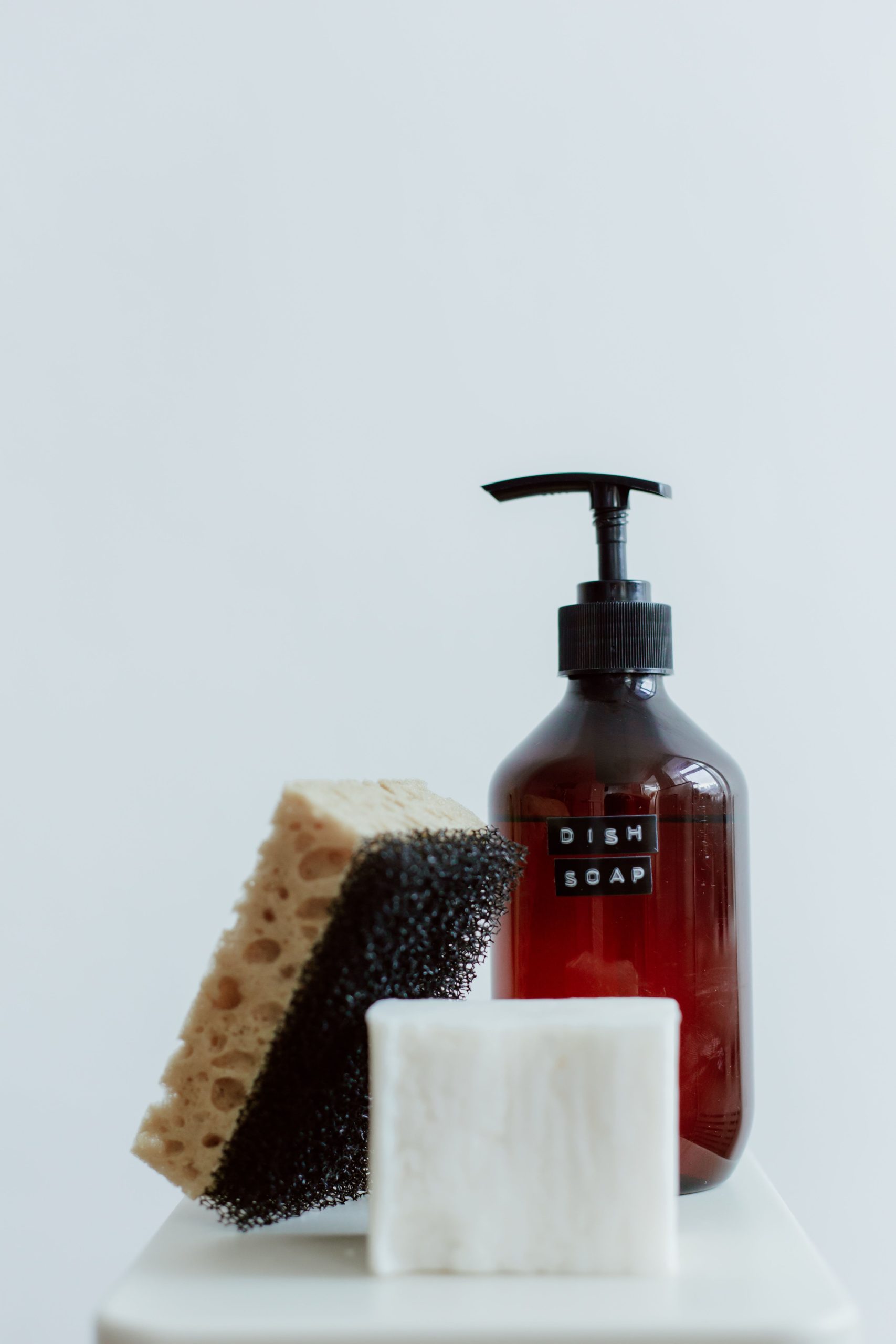 Bottle of dish soap and sponge