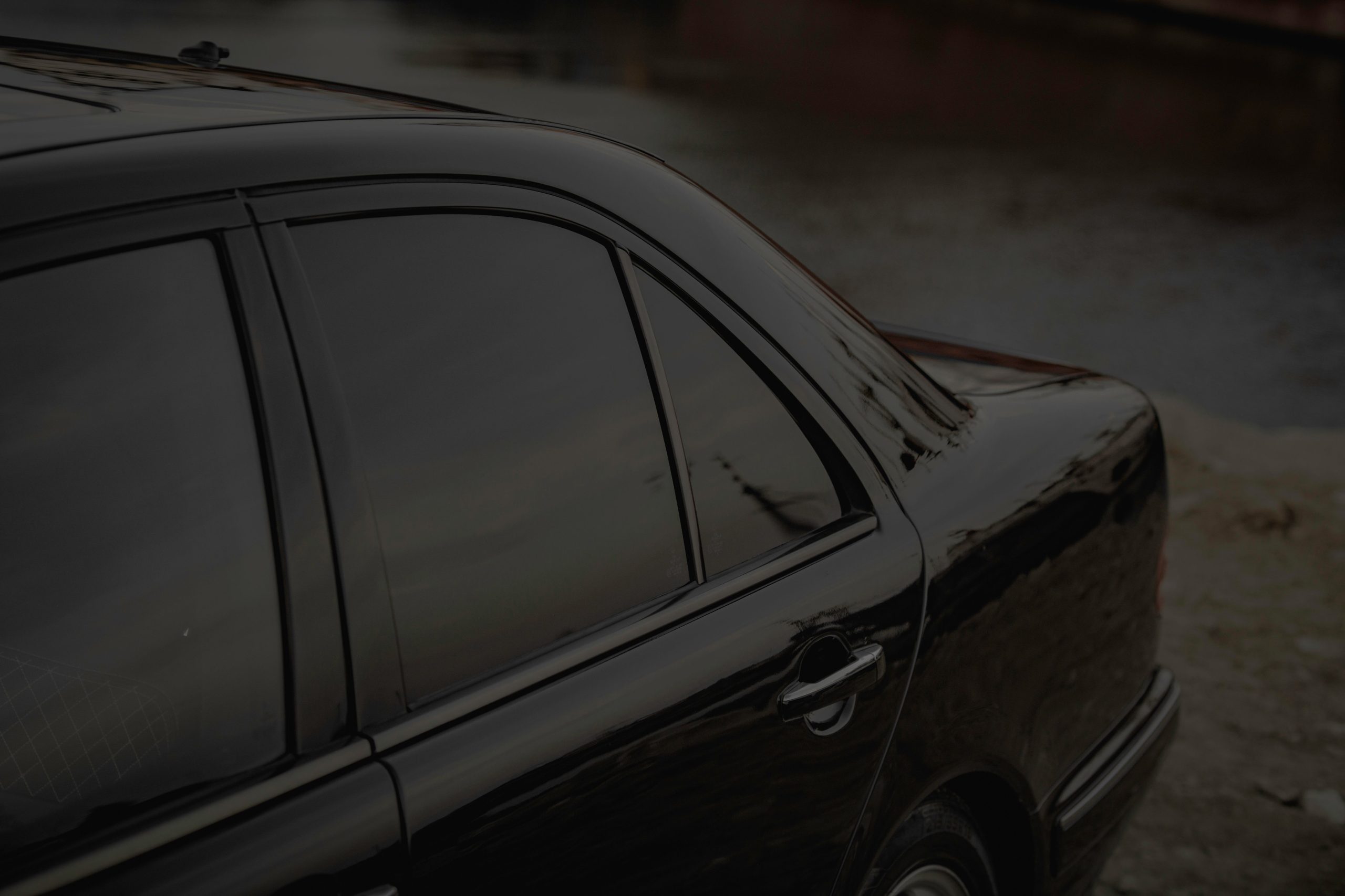 Tinted windows on a black car