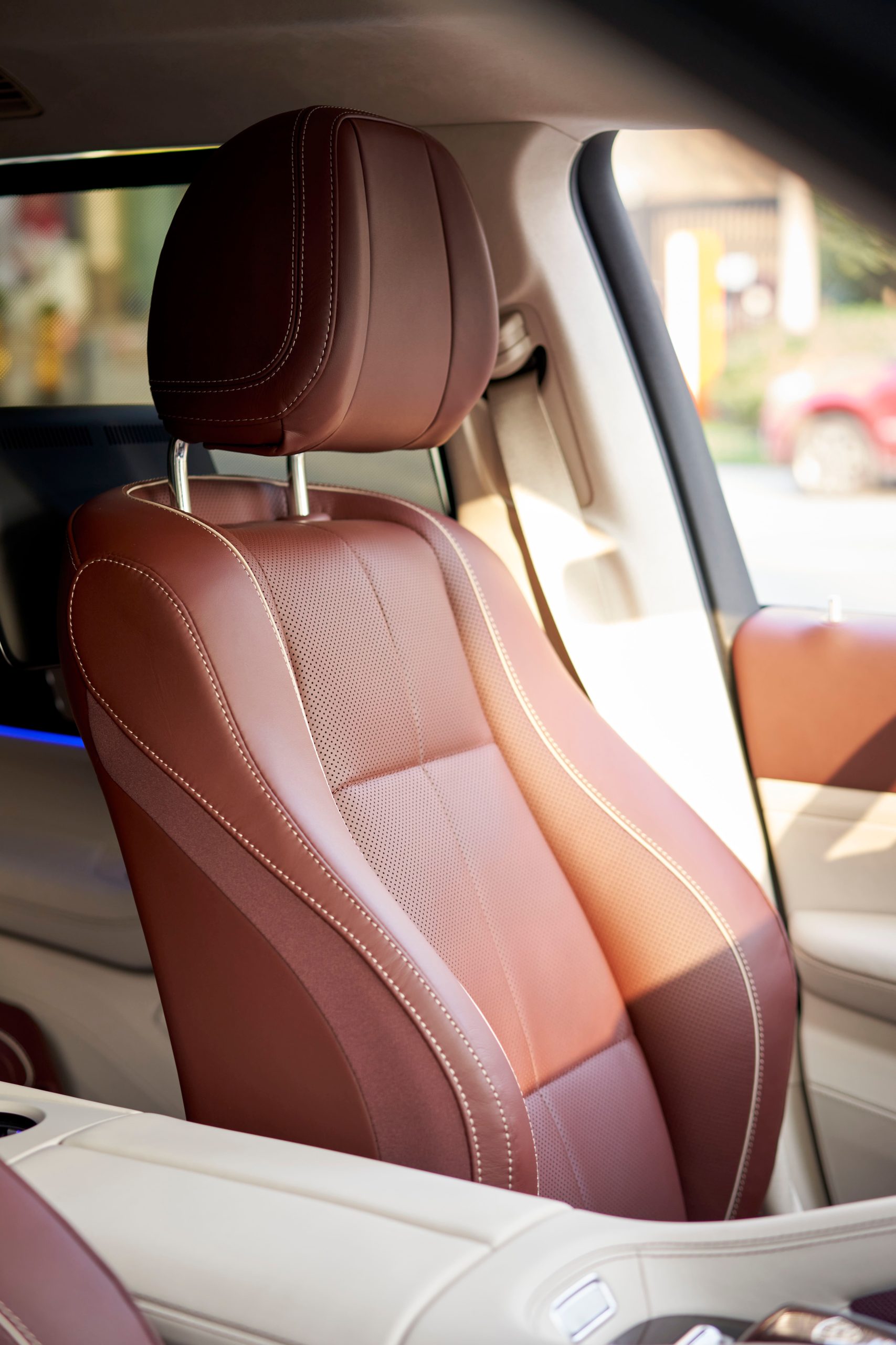 Brown leather car seat interior close-up