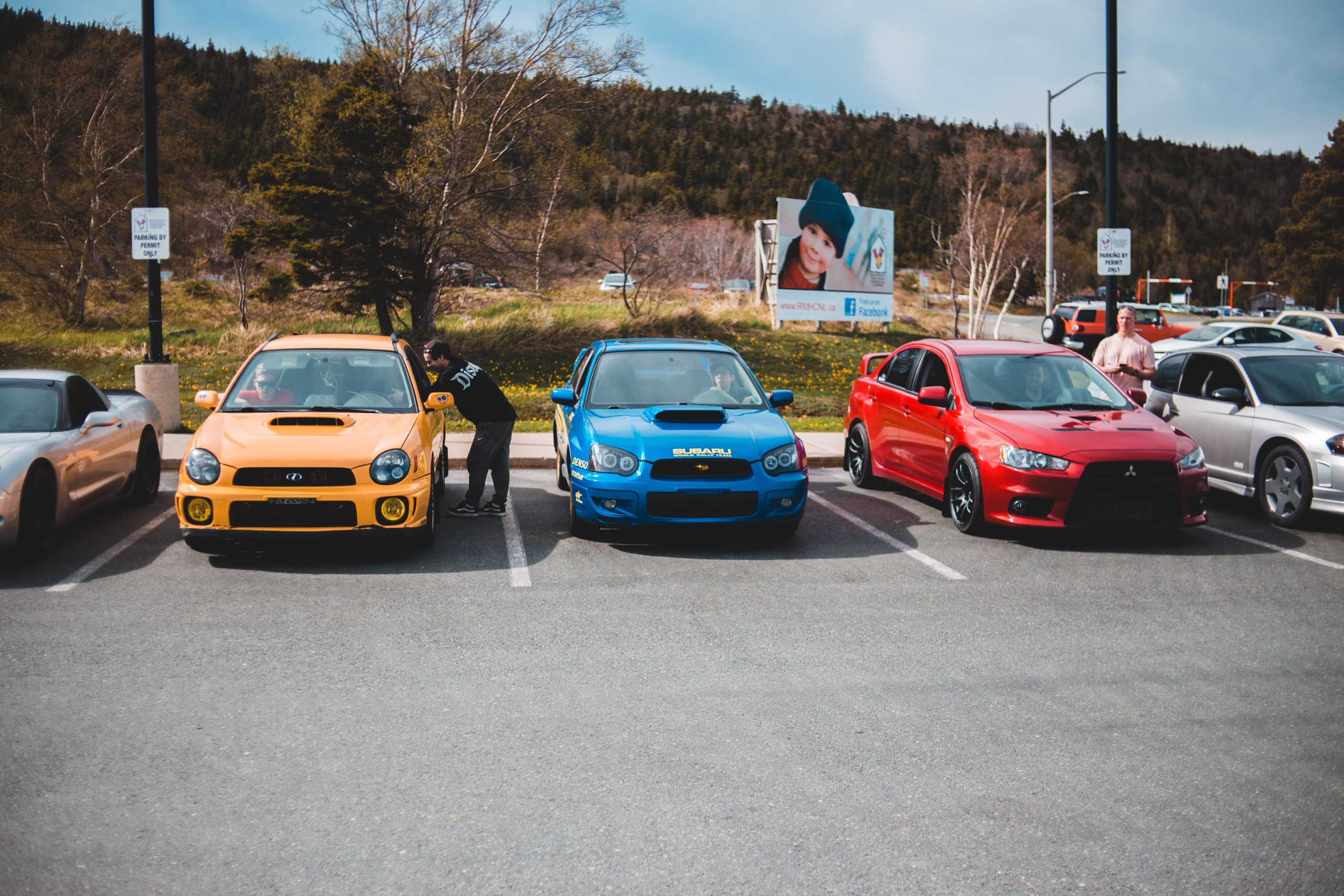 Cars parked outdoors in a parking lot